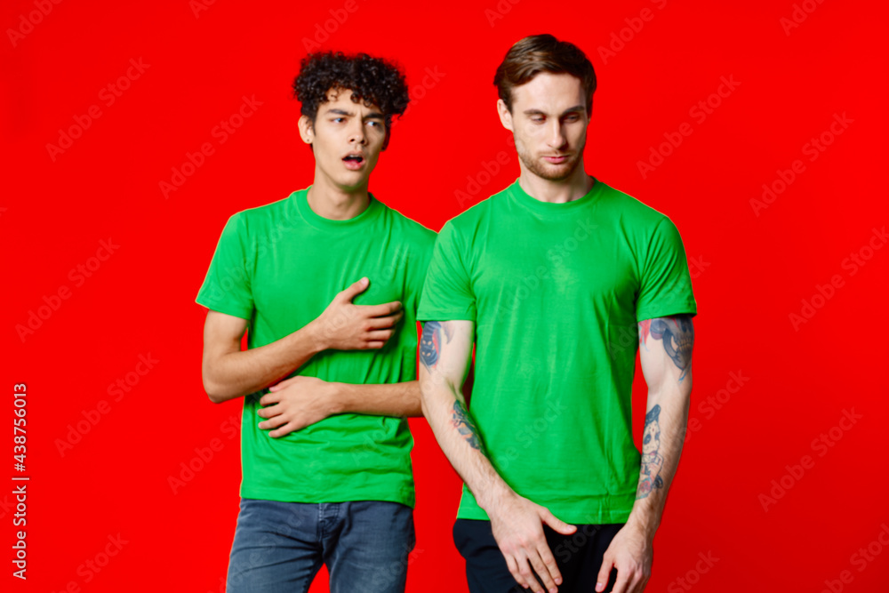 two men green t-shirt communication studio team two men green t-shirt communication studio team