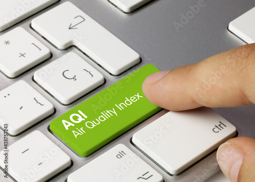 AQI Air Quality Index - Inscription on Green Keyboard Key.