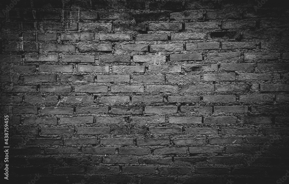 Black brick wall with shadow texture can be use as background Black brick wall with shadow texture can be use as background