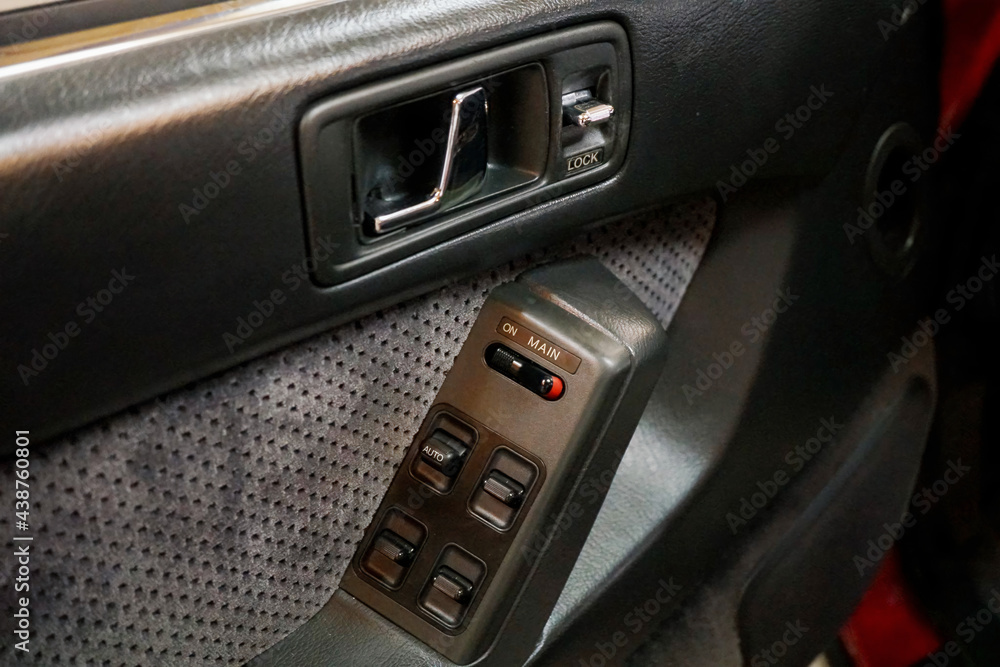 Close up of a car door, Control panel on driver's door