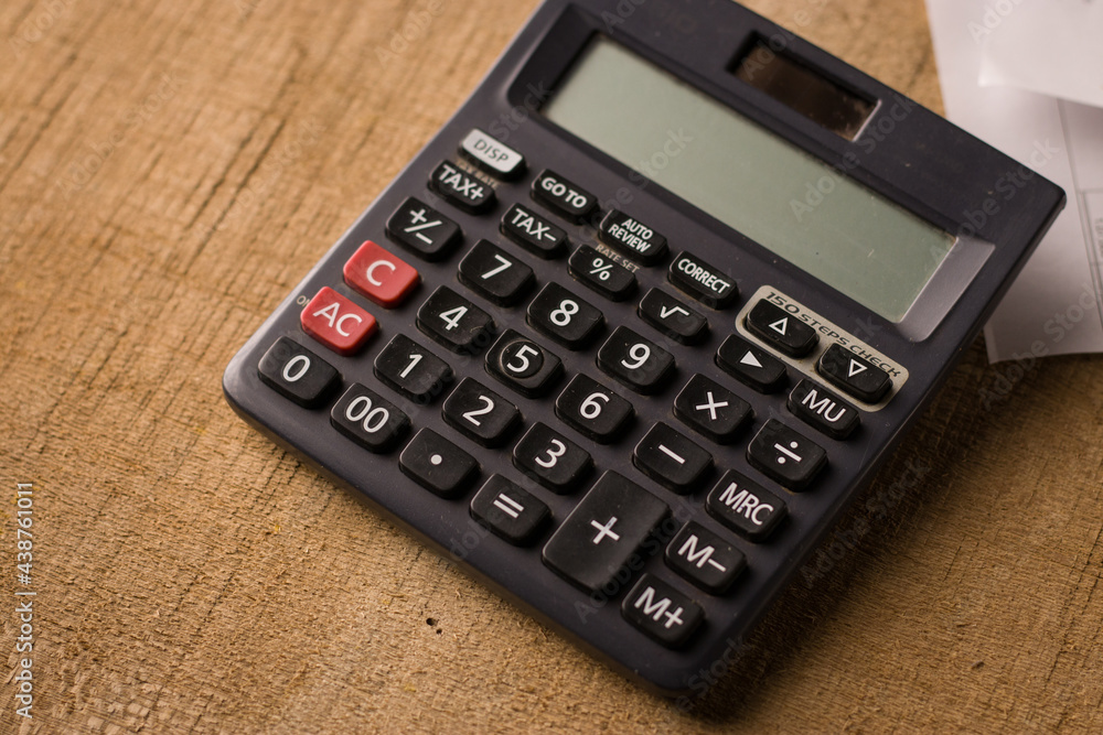 Black calculator on texture background stock image. Black calculator on texture background stock image.
