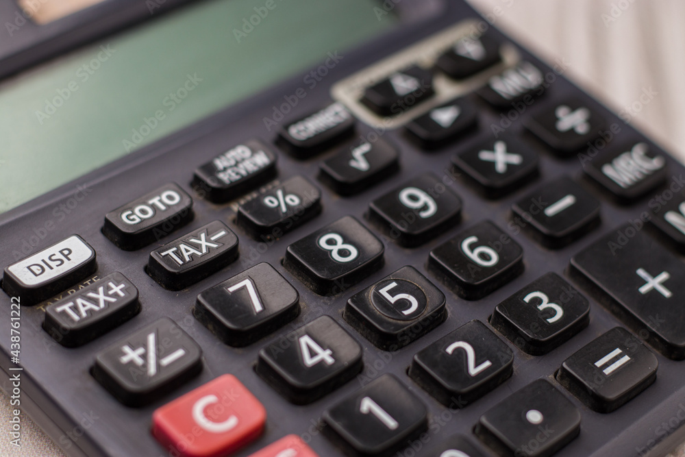 Black calculator on texture background stock image. Black calculator on texture background stock image.
