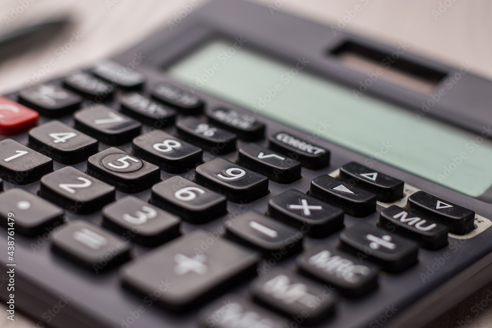 Black calculator on texture background stock image. Black calculator on texture background stock image.