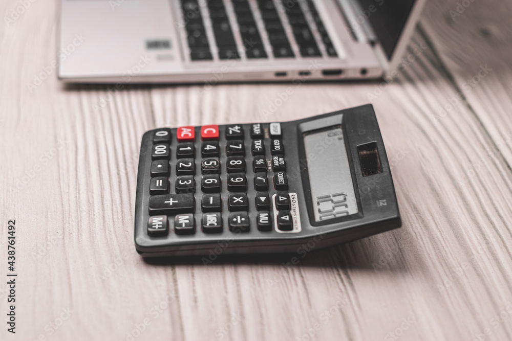 Black calculator on texture background stock image. Black calculator on texture background stock image.