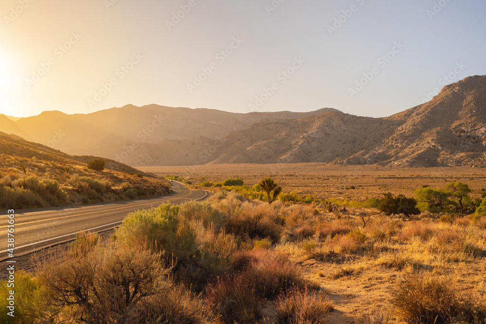 Beautiful hilly landscape in California at sunset, road in the mountains