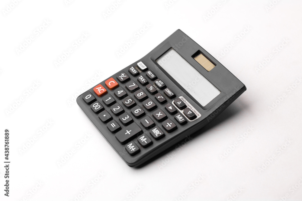 Black calculator on white background isolated stock image. Black calculator on white background isolated stock image.