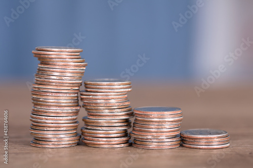 A row of declining dollar coins