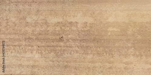 Fotografía panorama of road from above on surface of gravel road with car tire tracks
