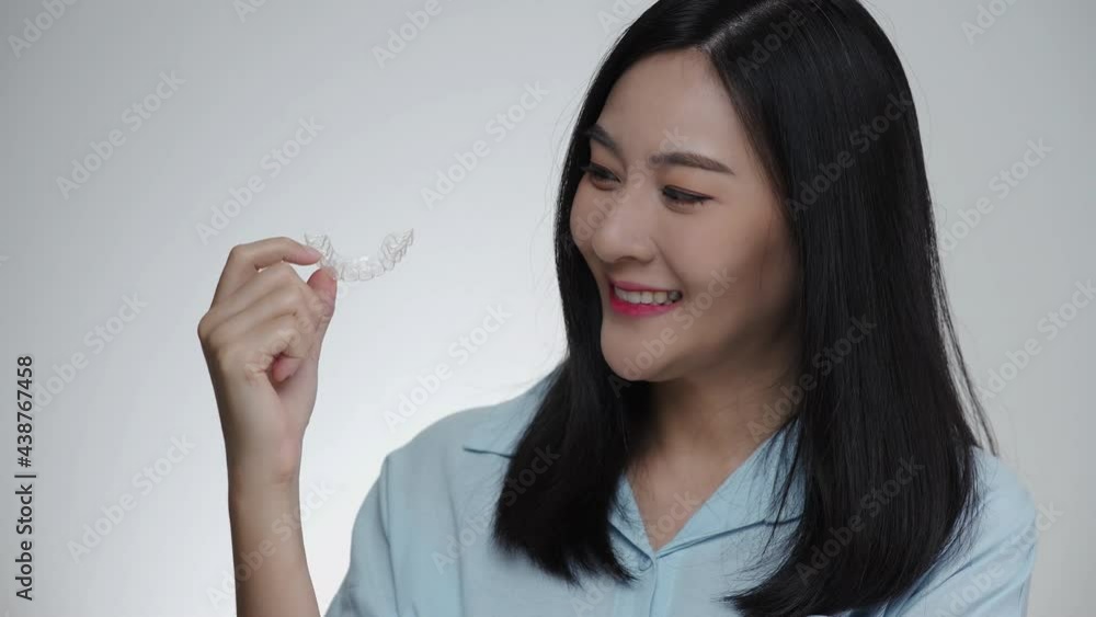 man wearing orthodontic silicone invisalign trainer. Mobile orthodontic appliance for dental correction. tooth whitening systems. man wearing orthodontic silicone invisalign trainer. Mobile orthodontic appliance for dental correction. tooth whitening systems.