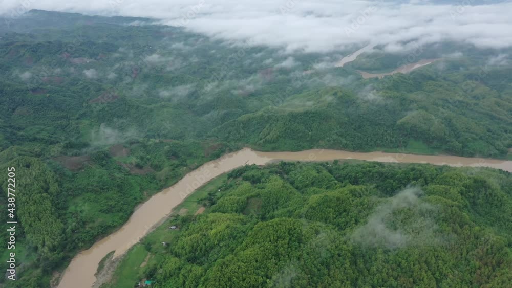 Aerial view of beautiful landscape with mountains and forest near Bagaichhari township, Chittagong, Bangladesh. Aerial view of beautiful landscape with mountains and forest near Bagaichhari township, Chittagong, Bangladesh.