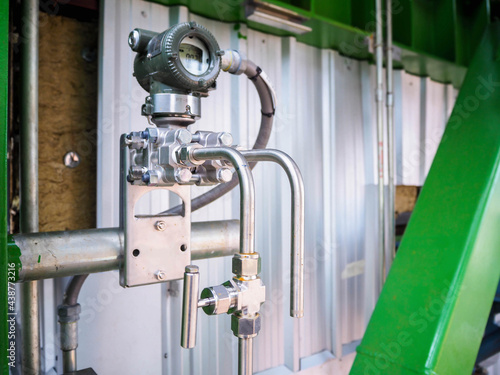 Pressure gauge of measuring instrument close up in industry zone at power plant with closed up