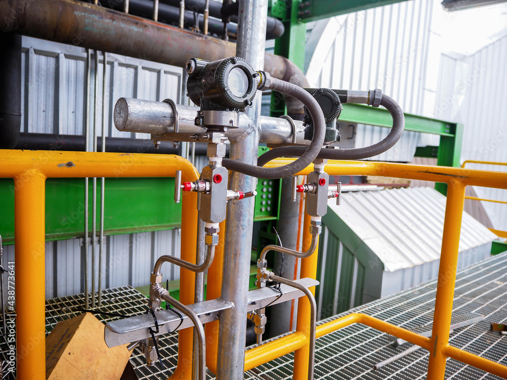 Pressure gauge of measuring instrument close up in industry zone at power plant with closed up Pressure gauge of measuring instrument close up in industry zone at power plant with closed up