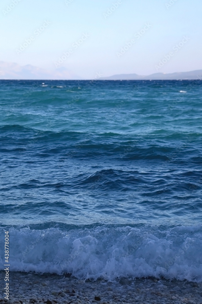 Waves on a beach in Croatia. Selective focus.