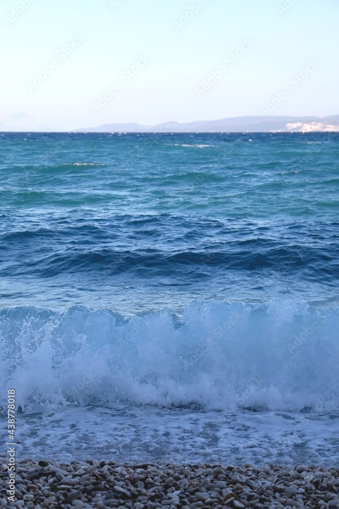 Waves on a beach in Croatia. Selective focus. Waves on a beach in Croatia. Selective focus.