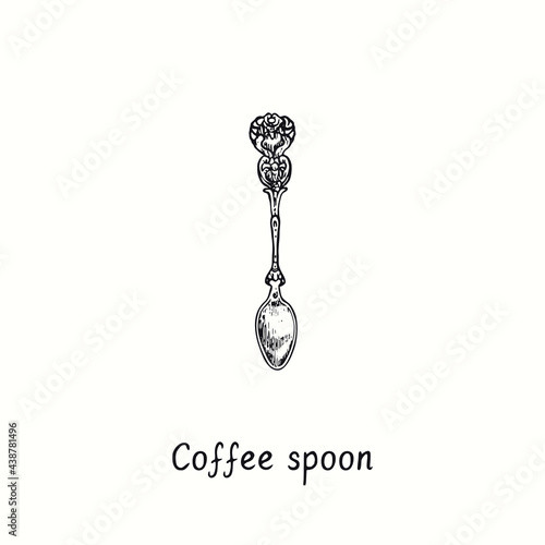 Coffee spoon with retro style decor. Ink black and white drawing woodcut vintage style  illustration