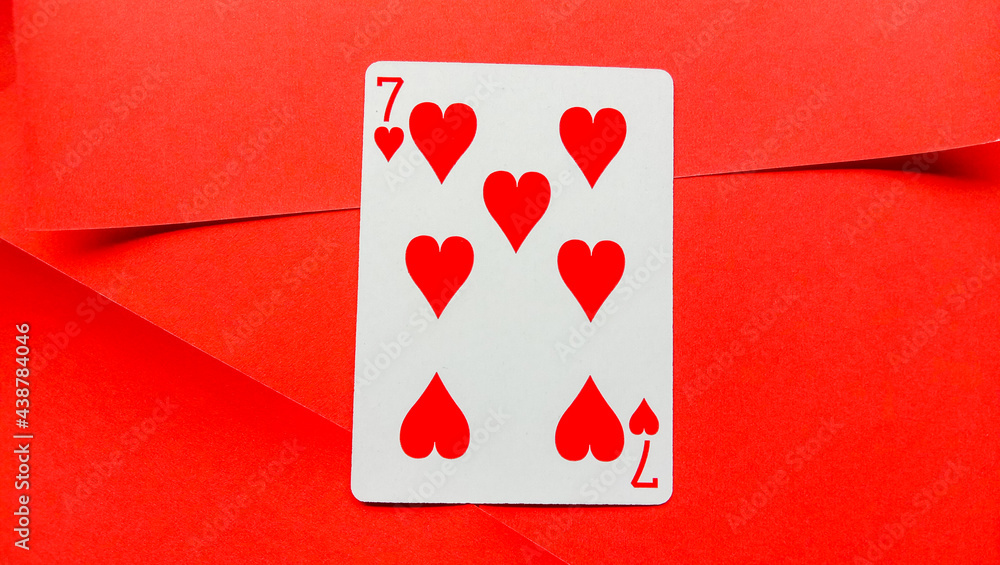 Playing cards are red on a red background Playing cards are red on a red background