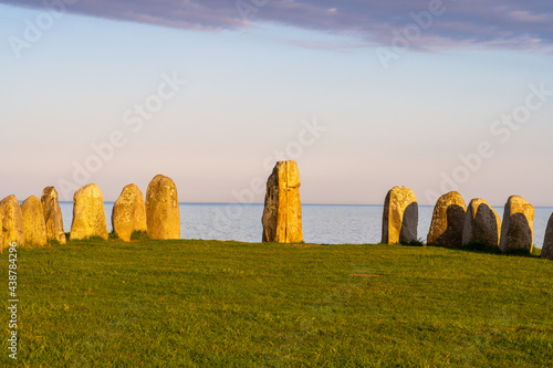 Ale Stones (Ales stenar) Is a megalithic monument of 59 large boulders and is 67 meters long. This landmark is located in Kåseberga, Sweden. photo