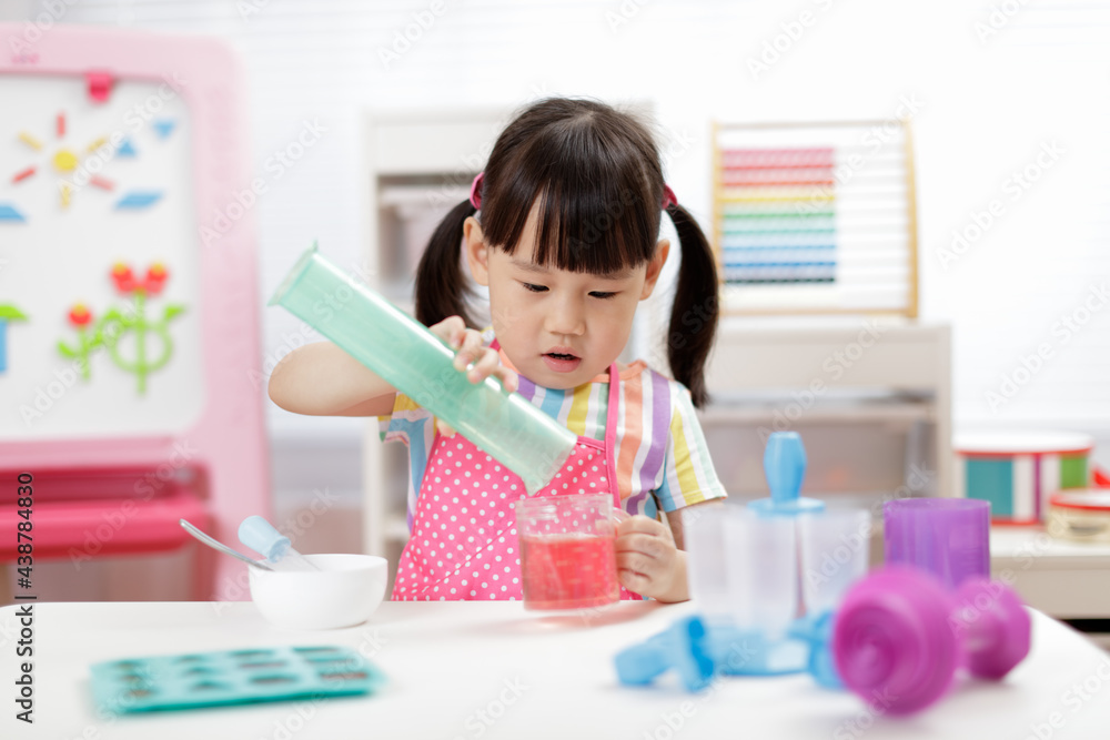 young girl making ice lolly for homeschooling young girl making ice lolly for homeschooling