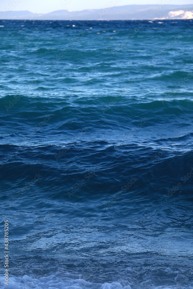 Waves on a beach in Croatia. Selective focus. Waves on a beach in Croatia. Selective focus.