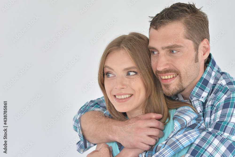Portrait of happy young couple posing at home Portrait of happy young couple posing at home