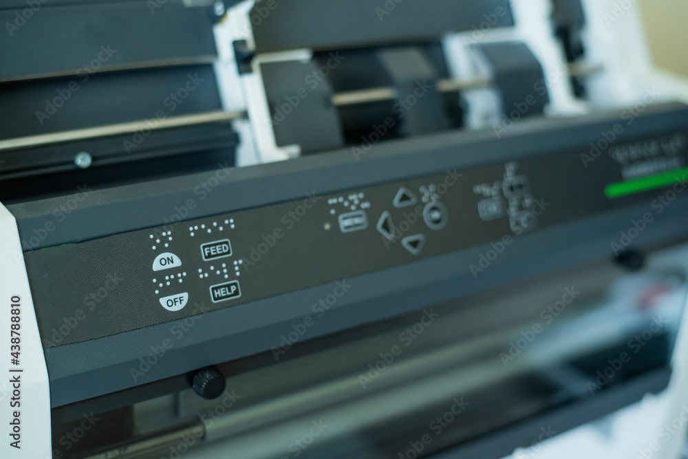 Close-up of equipment to print text on braille code for reading the blind Close-up of equipment to print text on braille code for reading the blind