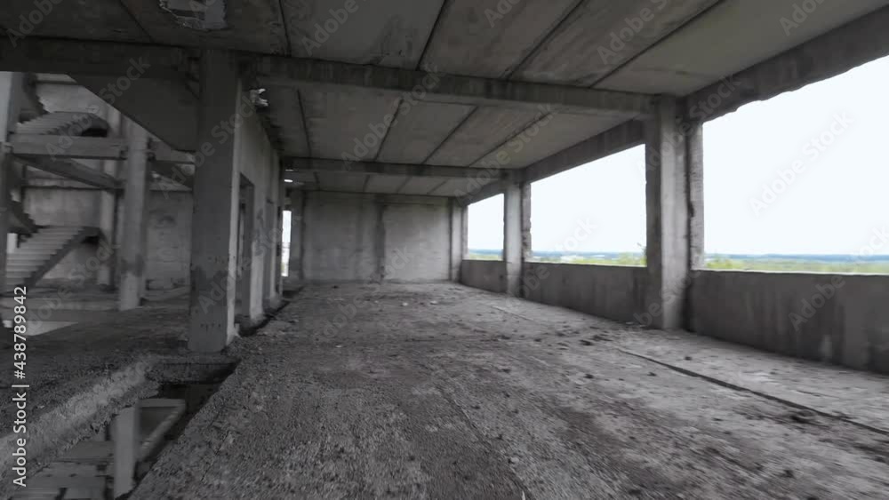 FPV drone flies maneuverable through an abandoned building. Post-apocalyptic location without people FPV drone flies maneuverable through an abandoned building. Post-apocalyptic location without people