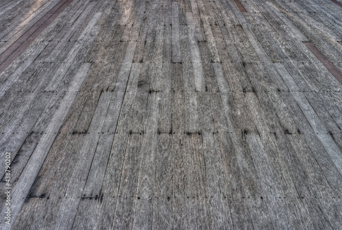 Old artificial wood floor. It constructed with fake lumbers.