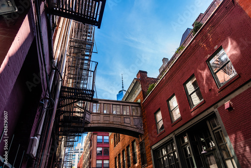 Low angle view of bridge on Staple Street in Tribeca in New York. Picturesque cityscape in Lower Manhattan