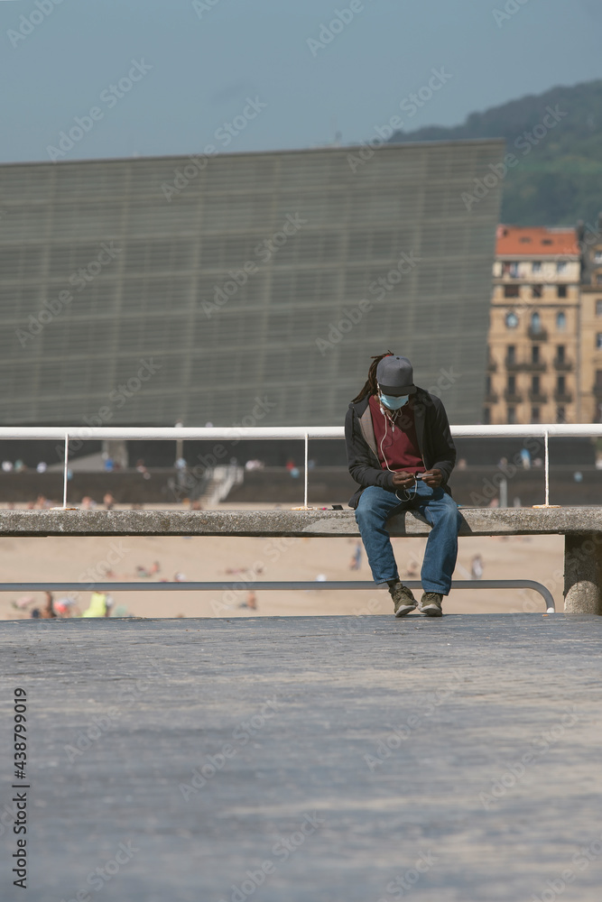 Fototapeta premium lonely man sitting on the street