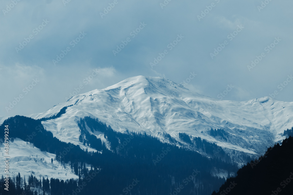 View of the mountain peak covered by snow at Manali in Himachal Pradesh, India	