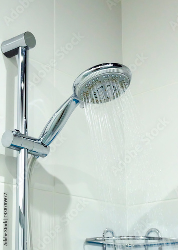 Shower head with jets of water close-up in the bathroom