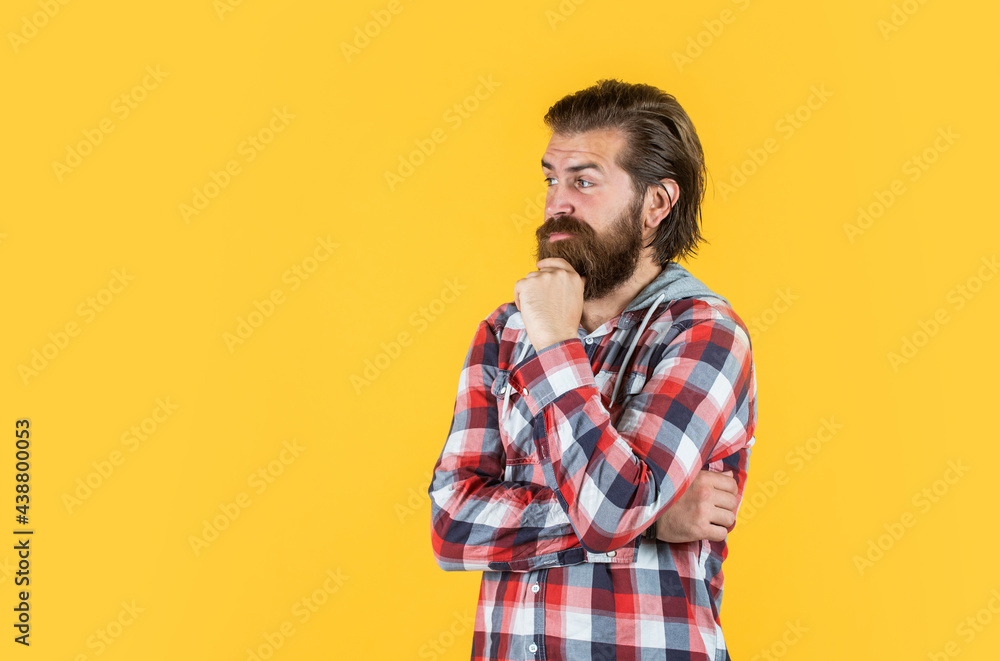 let me think. well groomed hairstyle. male beauty and fashion look. hipster checkered shirt for bearded guy. unshaven brutal man with beard. hairdresser concept. mature and confident let me think. well groomed hairstyle. male beauty and fashion look. hipster checkered shirt for bearded guy. unshaven brutal man with beard. hairdresser concept. mature and confident