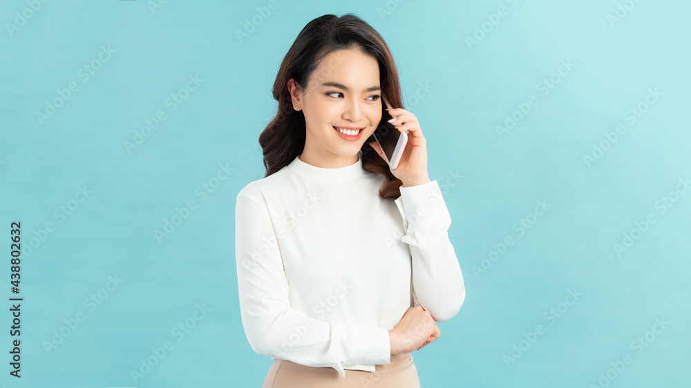 Businesswoman show of mobile phone. Businesswoman talking on the phone and showing a lot of emotions. Businesswoman show of mobile phone. Businesswoman talking on the phone and showing a lot of emotions.