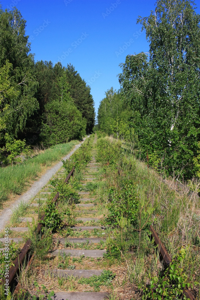 Old abandoned railway viaduct over the road