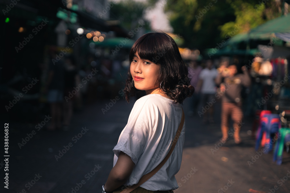 Portrait of Asian young woman  at street in bangkok, Thailand.