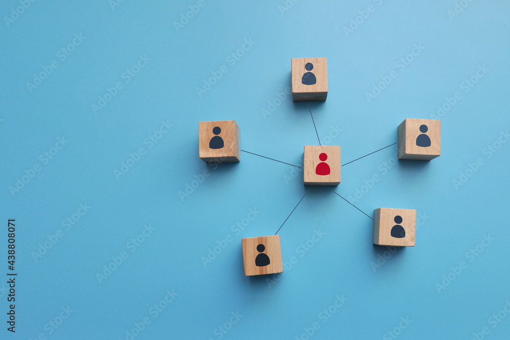 Wooden cubes with drawings of connections between people. A symbol of social ties between people
Wooden cubes with drawings of connections between people. A symbol of social ties between people