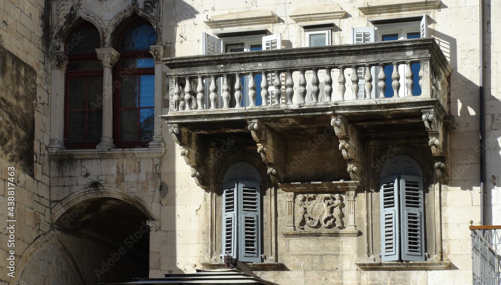 Impressive balcony of a medieval building with a coat of arms, Split, Croatia