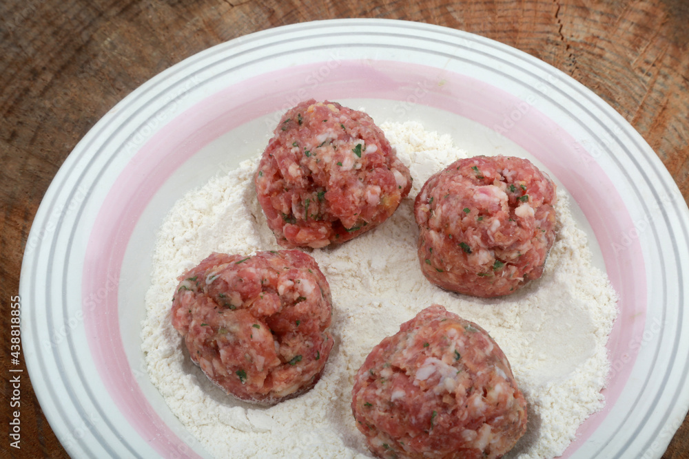 raw minced meat balls ready to cook 