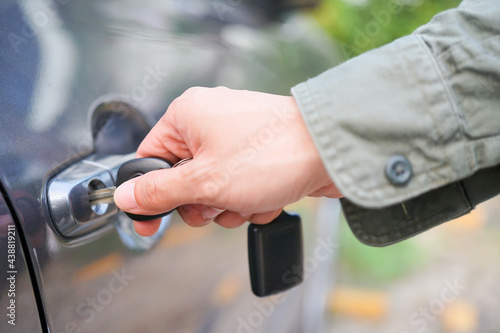 Hand on handle. Close-up of Asian man hand opening / close a car door, chauffeur car service driver sharing car pull Taxi home delivery background concept