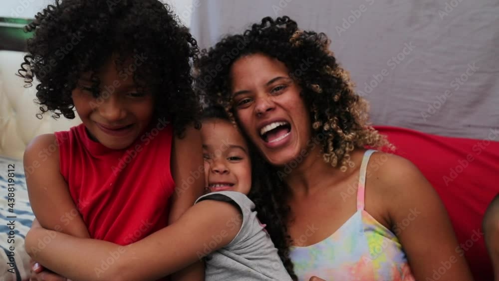 Hispanic happy family, parents and children at home sofa Hispanic happy family, parents and children at home sofa