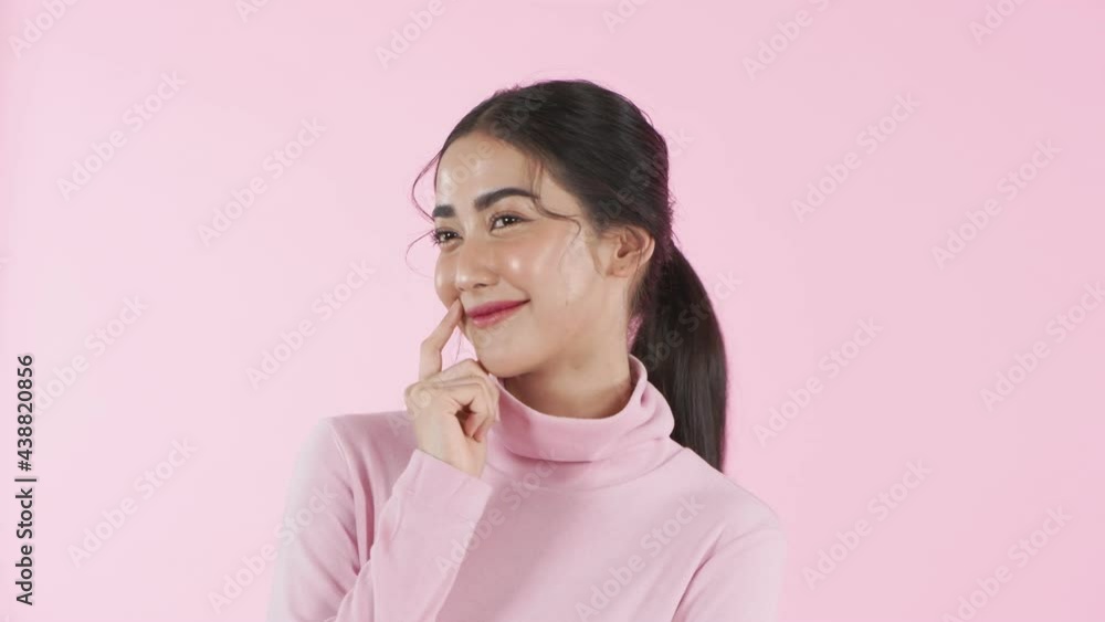 Beauty concept of 4k Resolution. Beautiful girls are feeling happy on a pink background. Beauty concept of 4k Resolution. Beautiful girls are feeling happy on a pink background.
