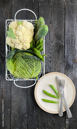Organic freshness cauliflower and Savoy cabbage, cucumbers, green peas, vegetables antioxidants high in vitamins, fiber food and nutrition