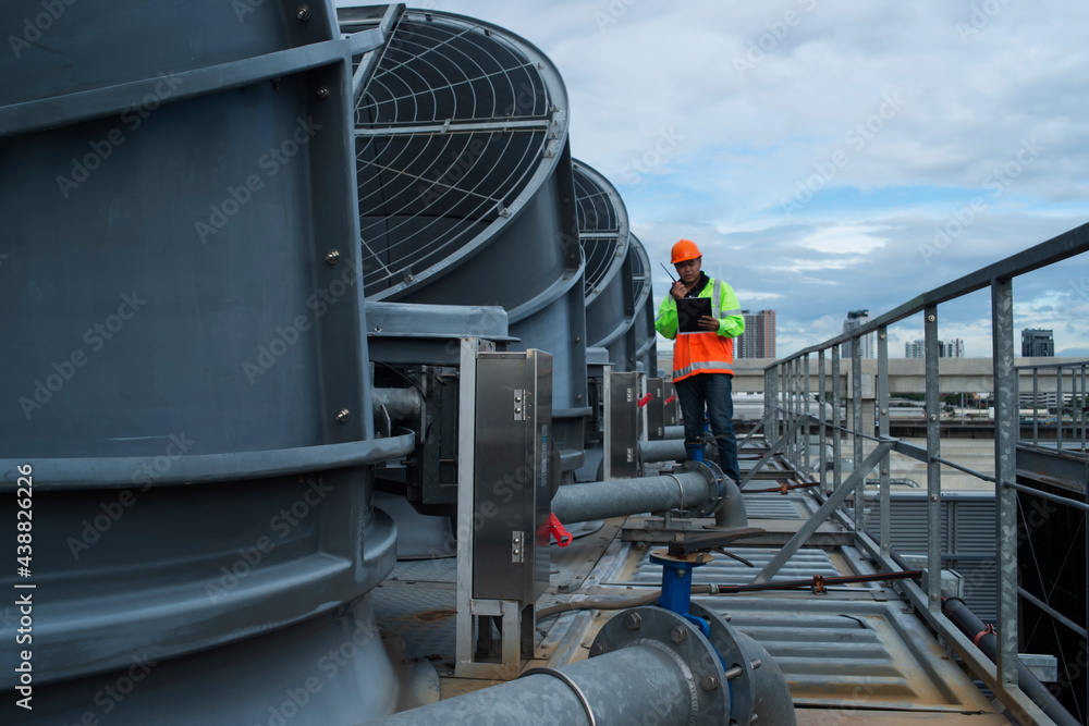 Naklejka premium industrial air system. worker at work