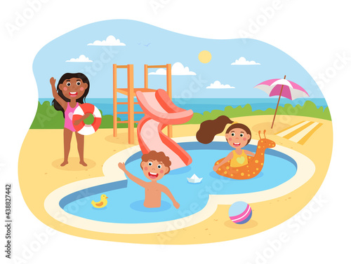 Little happy kids are having fun in aquapark together