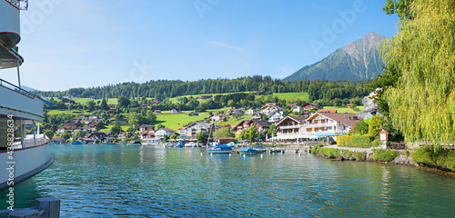 tourist resort Faulensee, at the lakeside of Thunersee, excursions with passenger liner, switzerland