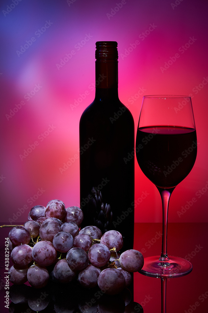 Bottle fault, glasses with wine and a grape bunch. Bottle fault, glasses with wine and a grape bunch.