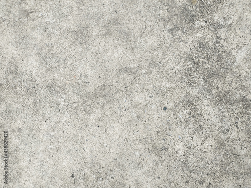 Surface of old gray cement floor close-up background.