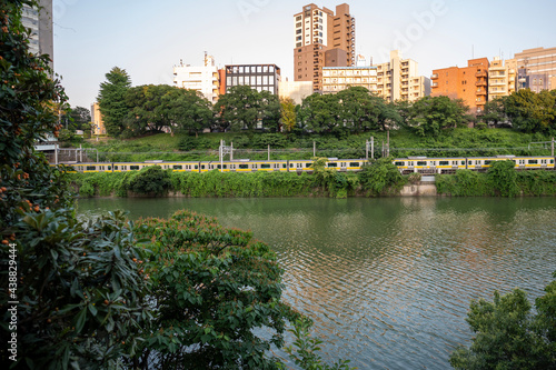 Metro train along the river in Tokyo