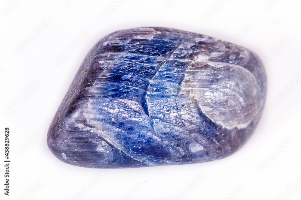Macro mineral stone sapphire on white background Macro mineral stone sapphire on white background