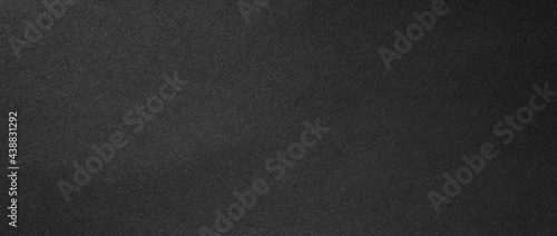 Paper black texture background.Paper surface made from thin wood pulp and can be recycled.